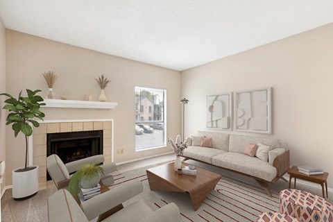 a living room with a couch and a fireplace